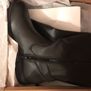 Black Knee High Boots from Charlotte Russe.